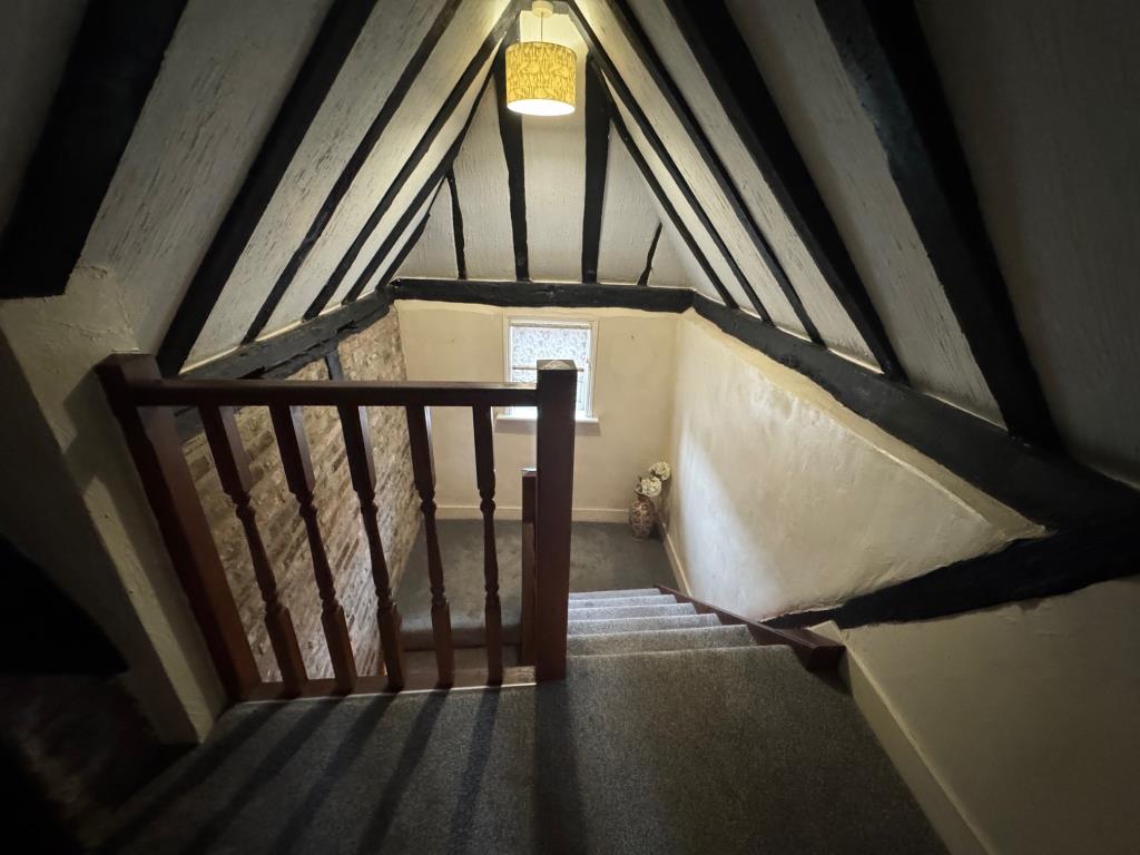 Lot: 109 - THREE-BEDROOM COTTAGE FOR IMPROVEMENT - Landing and stairs